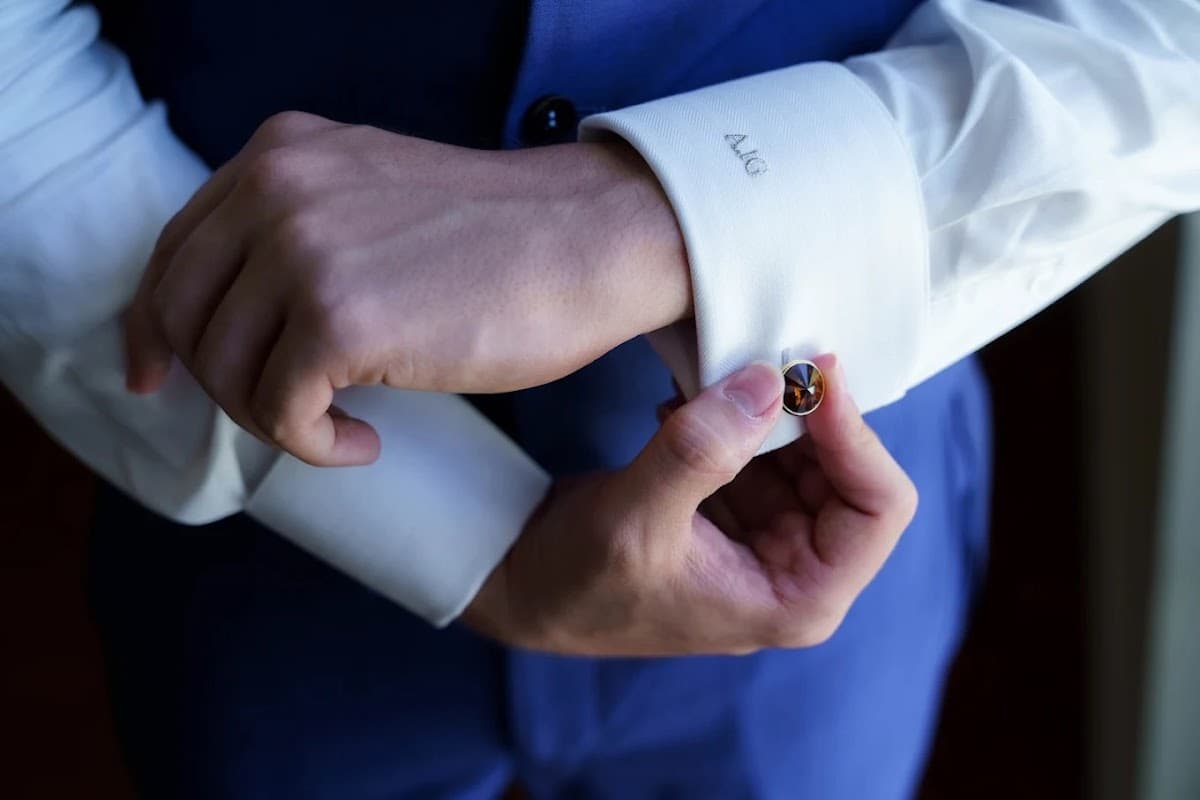 Well-dressed man wearing a custom suit with a perfectly folded pocket square by Bespoke By CB
