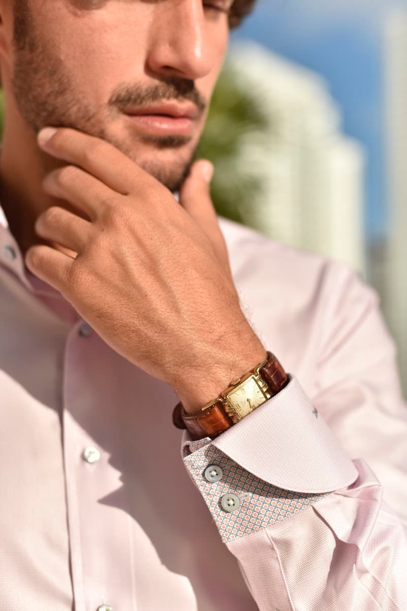 Custom dress shirt with contrast cuff and gold watch detail, crafted by Bespoke By CB in Miami