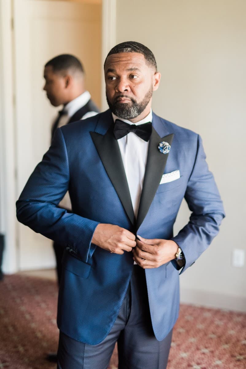 Impeccably tailored custom suit on a client at Bespoke By CB in Miami