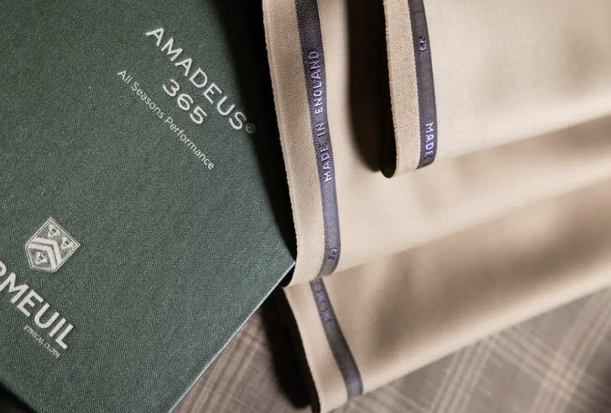 Dormeuil Amadeus 365 all-seasons performance fabric book with cream wool and Made in England selvedge