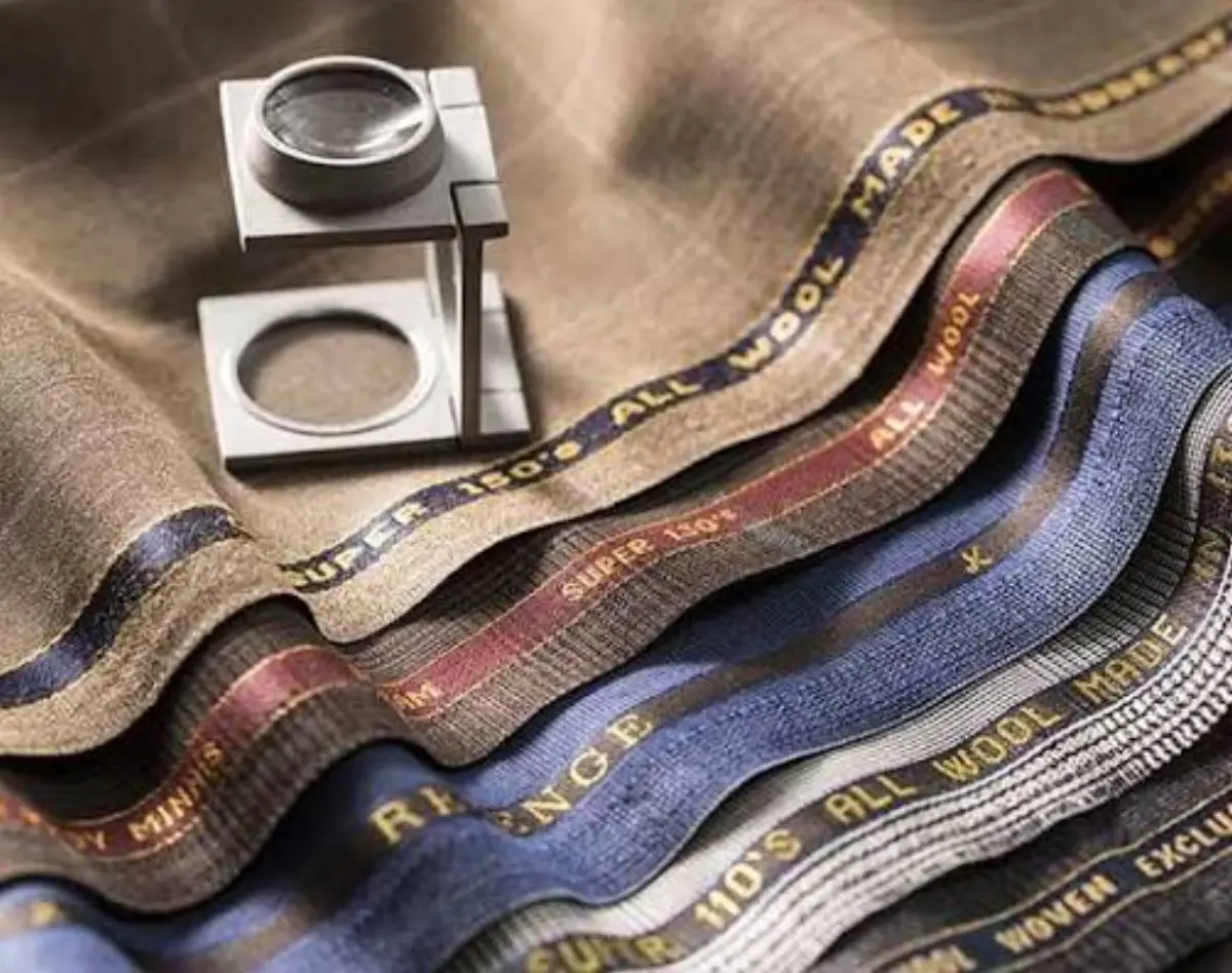 Gladson fabric selection with selvedge detail and magnifying loupe