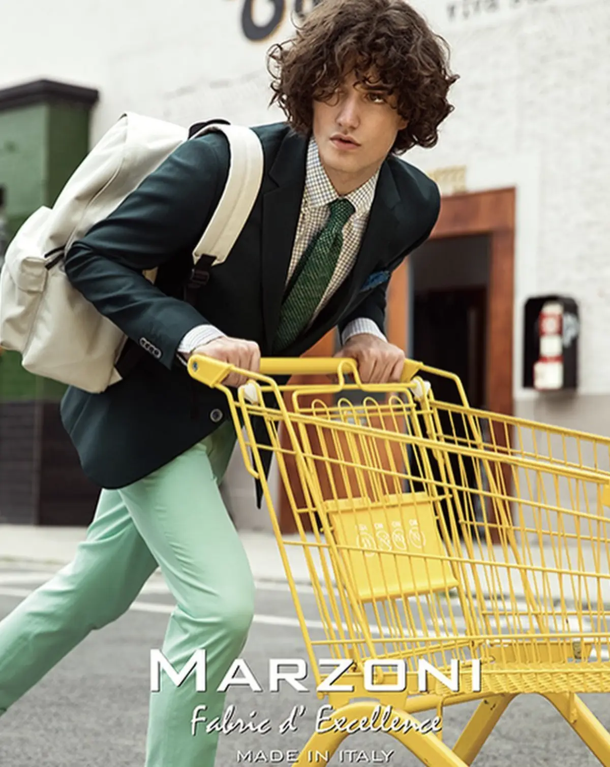Marzoni light blue blazer styled in Mediterranean desert setting — resort suiting fabric