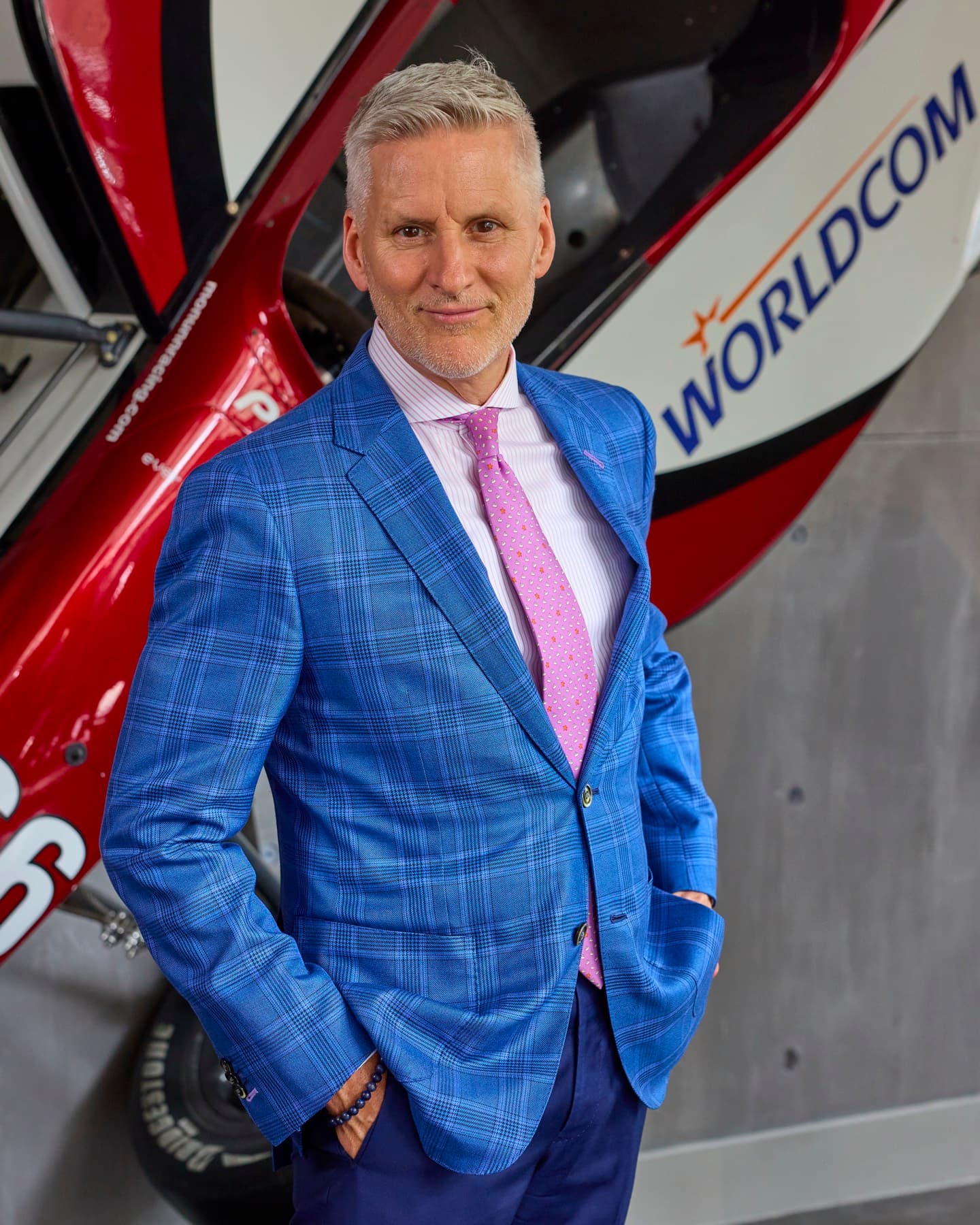 Christian Boehm providing personalized custom suit consultation at Bespoke By CB Miami showroom