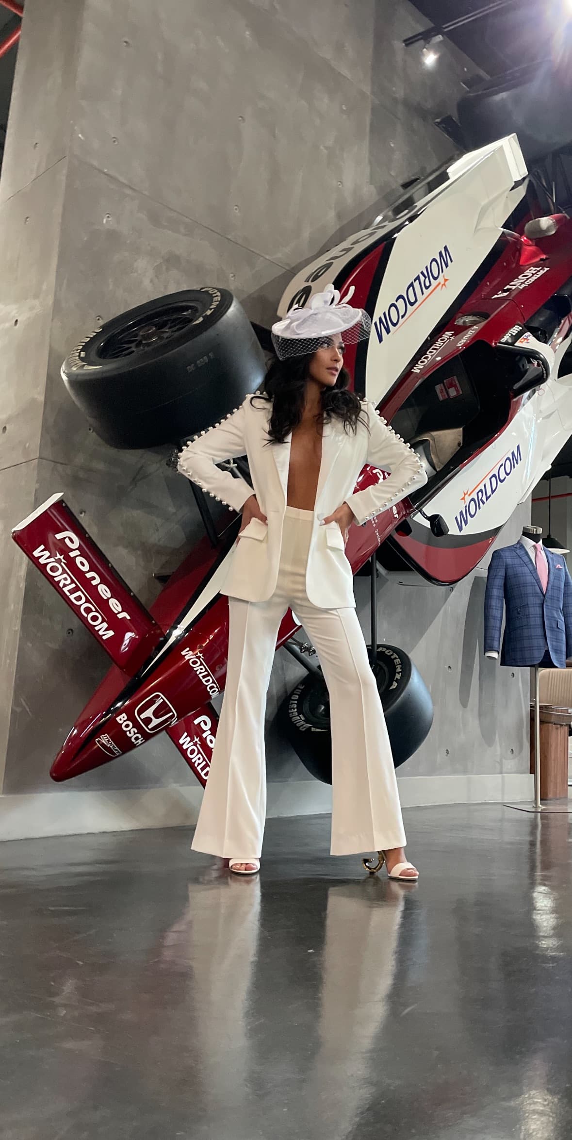 Women's custom clothing collection at Bespoke By CB Miami — tailored suits, blouses, and dresses