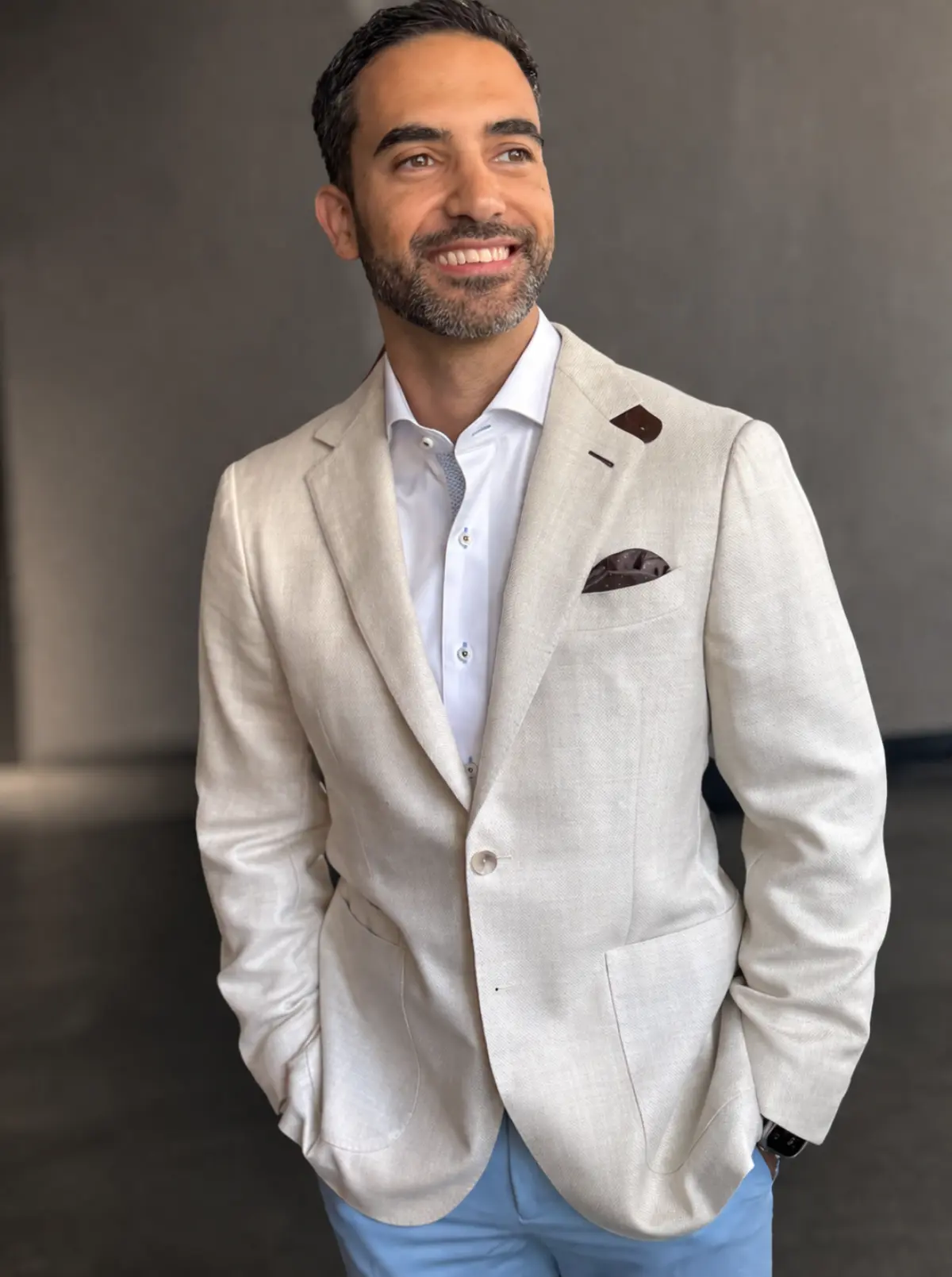 Client wearing a custom linen sport coat styled by Christian Boehm during a wardrobe consultation at Bespoke By CB