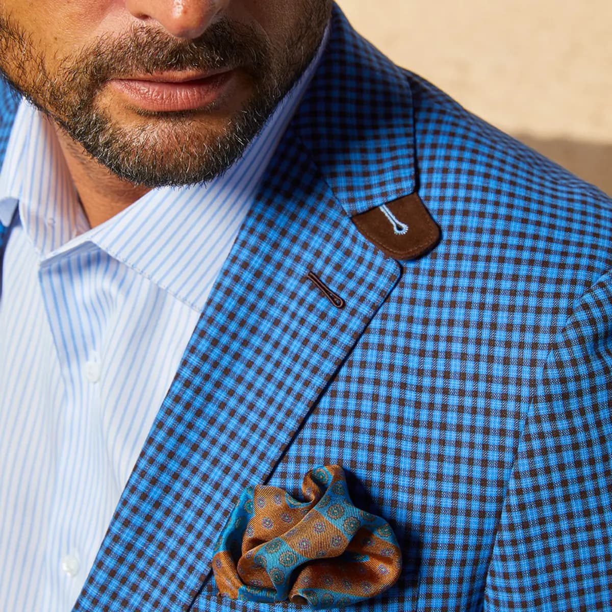 Suit lapel styles styled with custom menswear by Bespoke By CB Miami