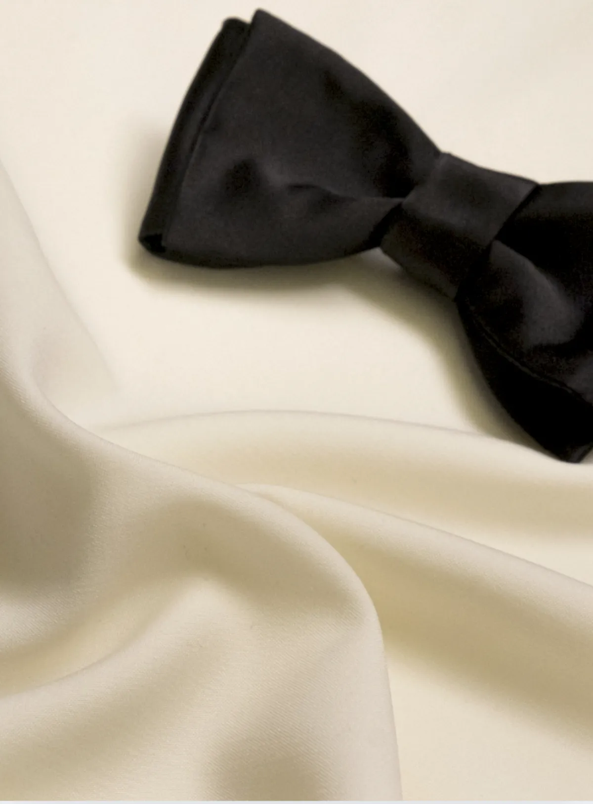 Bow tie styling with custom black tie formalwear by Bespoke By CB South Florida