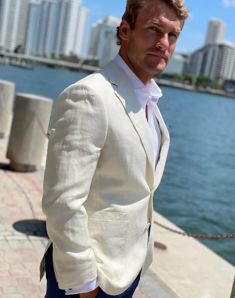 Man wearing a custom linen suit for warm-weather tailoring by Bespoke By CB South Florida