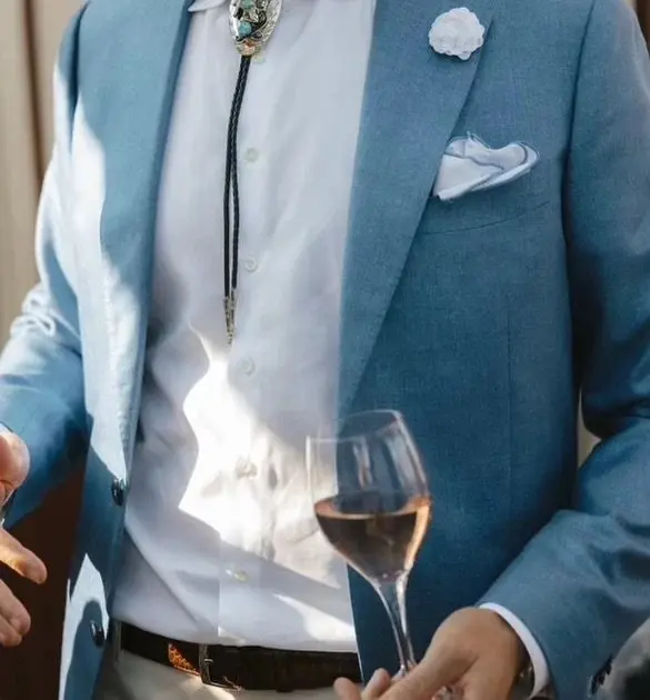 Man wearing a custom blue suit tailored by Bespoke By CB South Florida