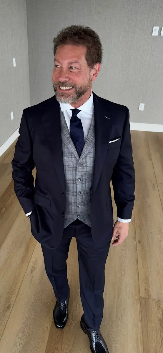 Custom suit fitting and tailoring consultation at Bespoke By CB South Florida