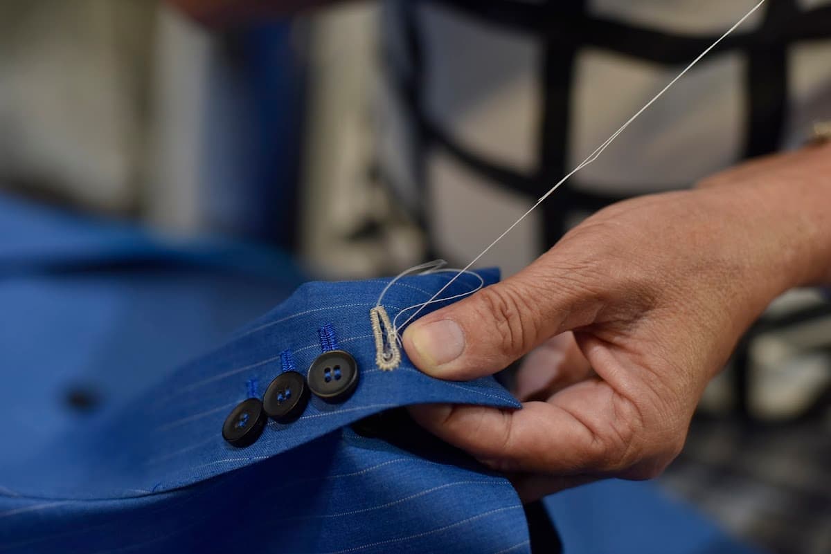 Custom suit fitting and tailoring consultation at Bespoke By CB South Florida