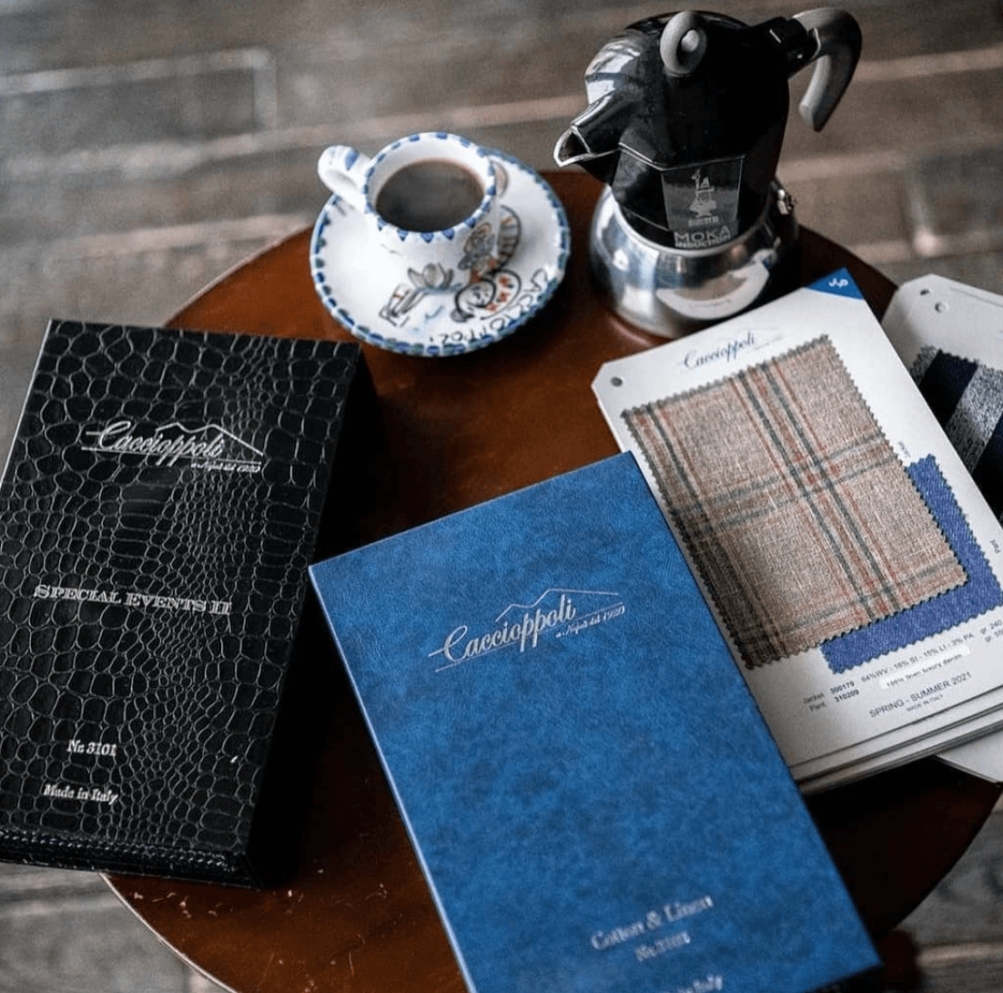 Caccioppoli fabric sample books and swatch cards in muted plaids and solid tones