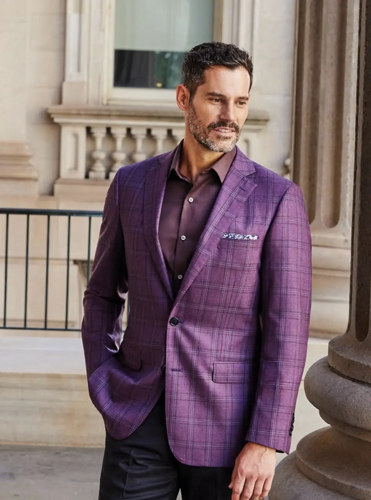 Man wearing Gladson purple plaid blazer with pocket square — Italian suiting fabric styled look