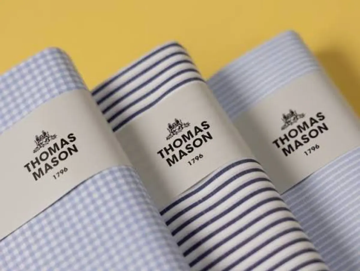 Thomas Mason 1796 fabric swatches with gingham and striped shirt cloths