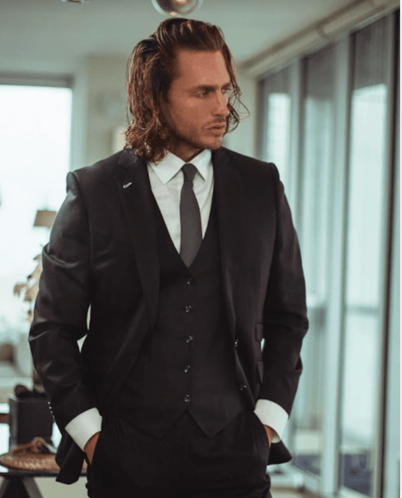 Custom black three-piece wedding suit by Bespoke By CB Miami