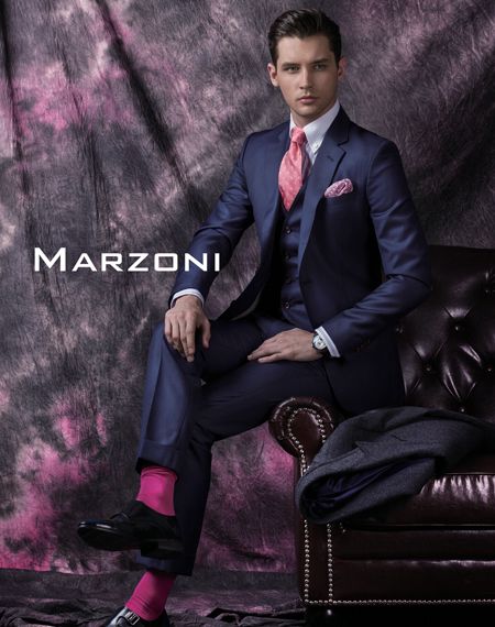 Man wearing a navy suit for Christian Boehm suit color guide